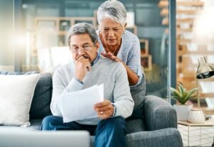 couple reviewing home value documentation