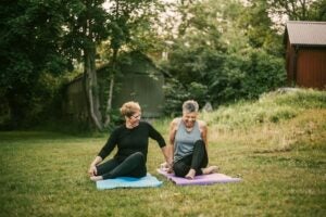 Women doing yoga and finding happiness in retirement