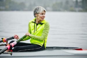 Woman rowing for retirement success