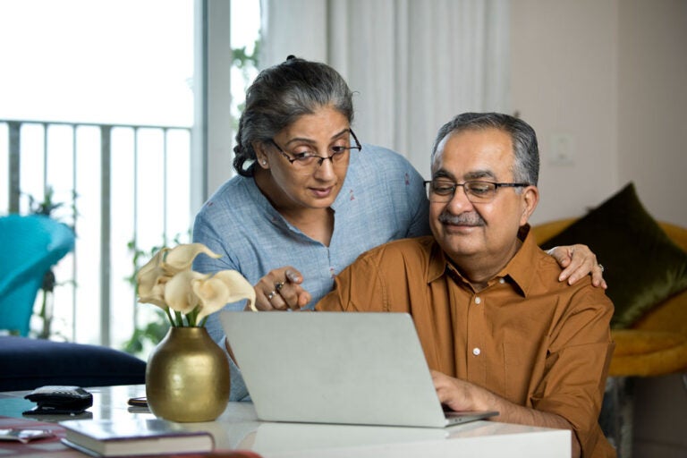A couple learning what a reverse mortgage is
