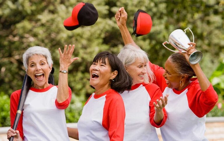 women celebrating best age to retire