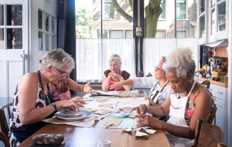A senior's crafting club meeting after they learned how to start a club in retirement