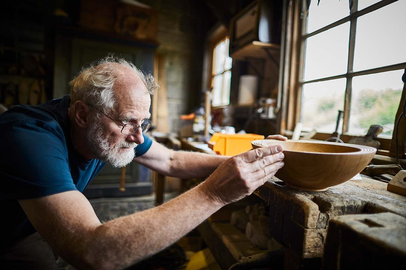 AS man making extra money in retirement with his woodworking hobby