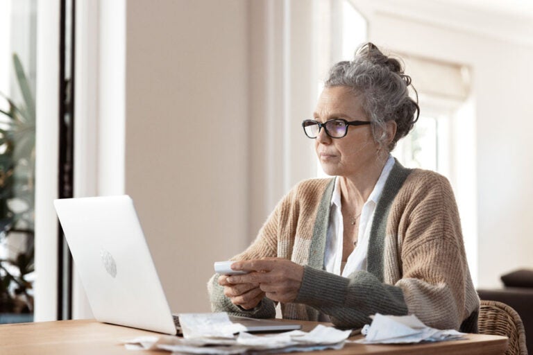 A woman researching what to do when a reverse mortgage isn't right for you