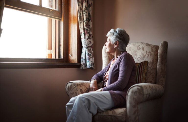 A woman wondering if she will outlive a reverse mortgage