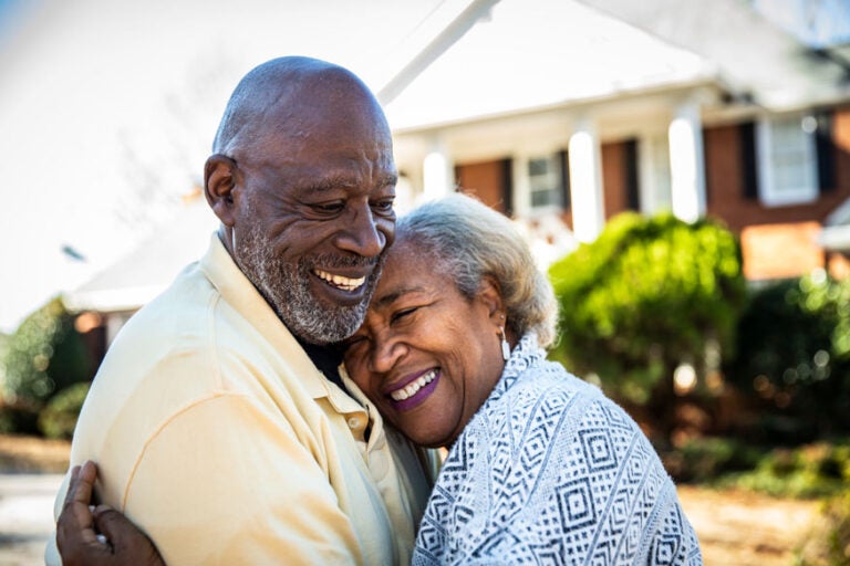 a couple celebrates their retirement mortgage