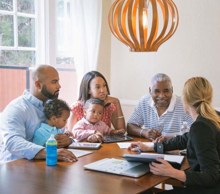A family discussing a reverse mortgage