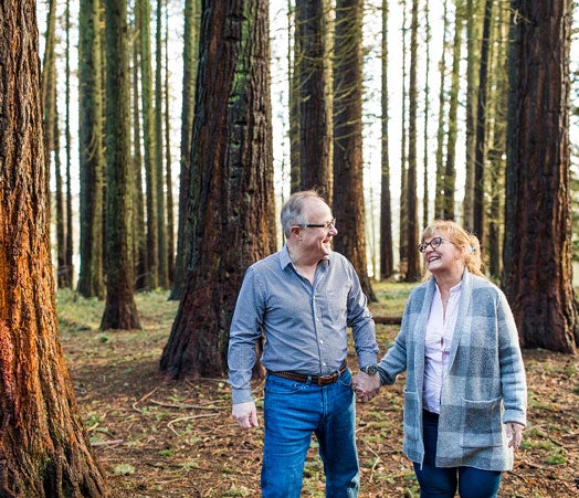 People who decided to retire in the forest enjoying a walk